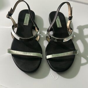 Sleek Black and Silver Flat Sandals with Slingback